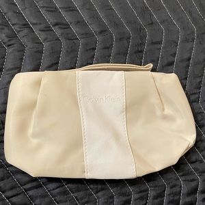 Calvin Klein Crème/Tan Soft Cloth Clutch with single wristlet strap, never used